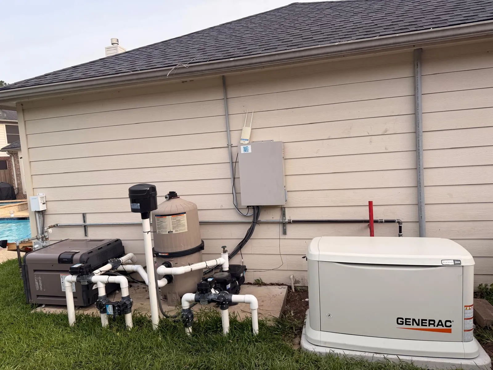 Completed Generac standby generator installation beside a Texas home